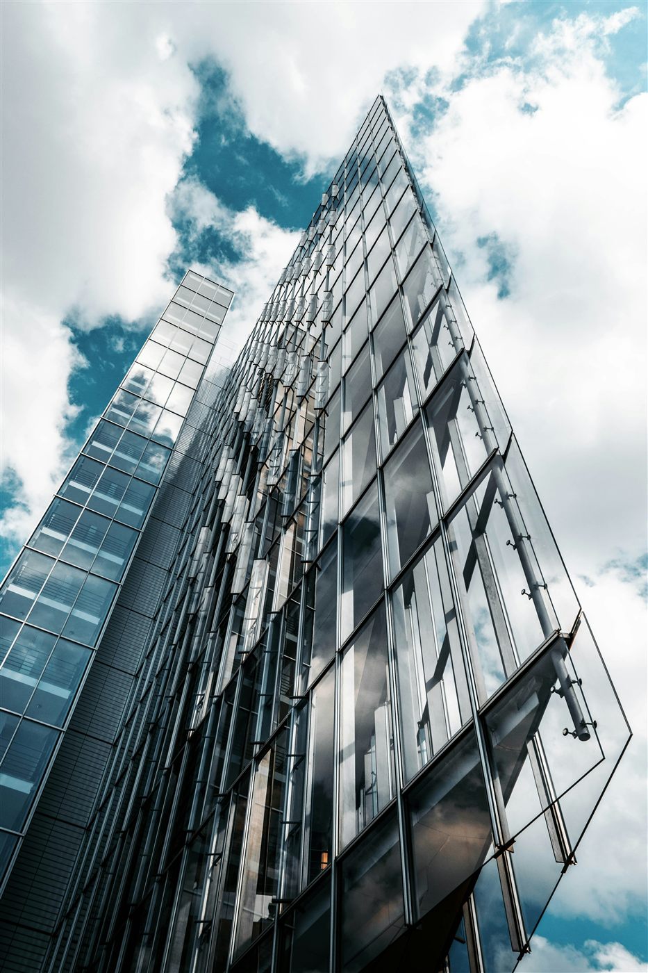 Modern glass office tower, representing the growing businesses Vantage IT Partners supports